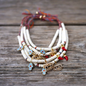 WHITE BEADS BRACELET